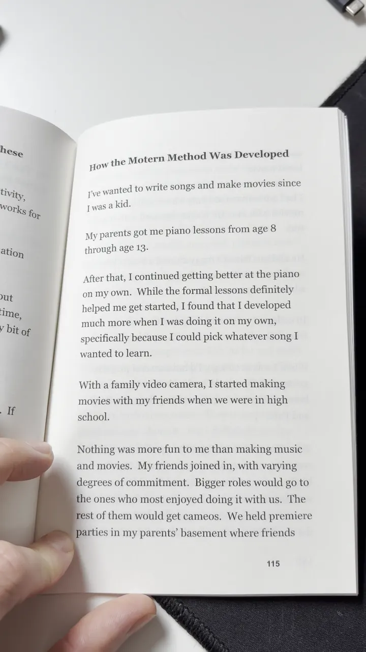 Frame 1: page 115, How the Motern Method Was Developed, with page 114 half hidden in the curve of the book and my thumb at the bottom