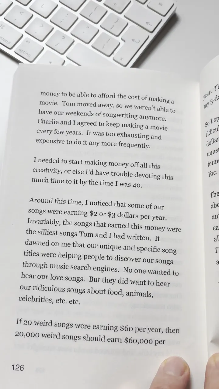 Frame 72 of the video: page 126, sharp and readable from the first line, “money to be able to afford the cost of making a movie”
